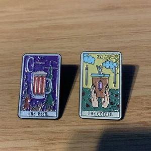 Two enamel pins